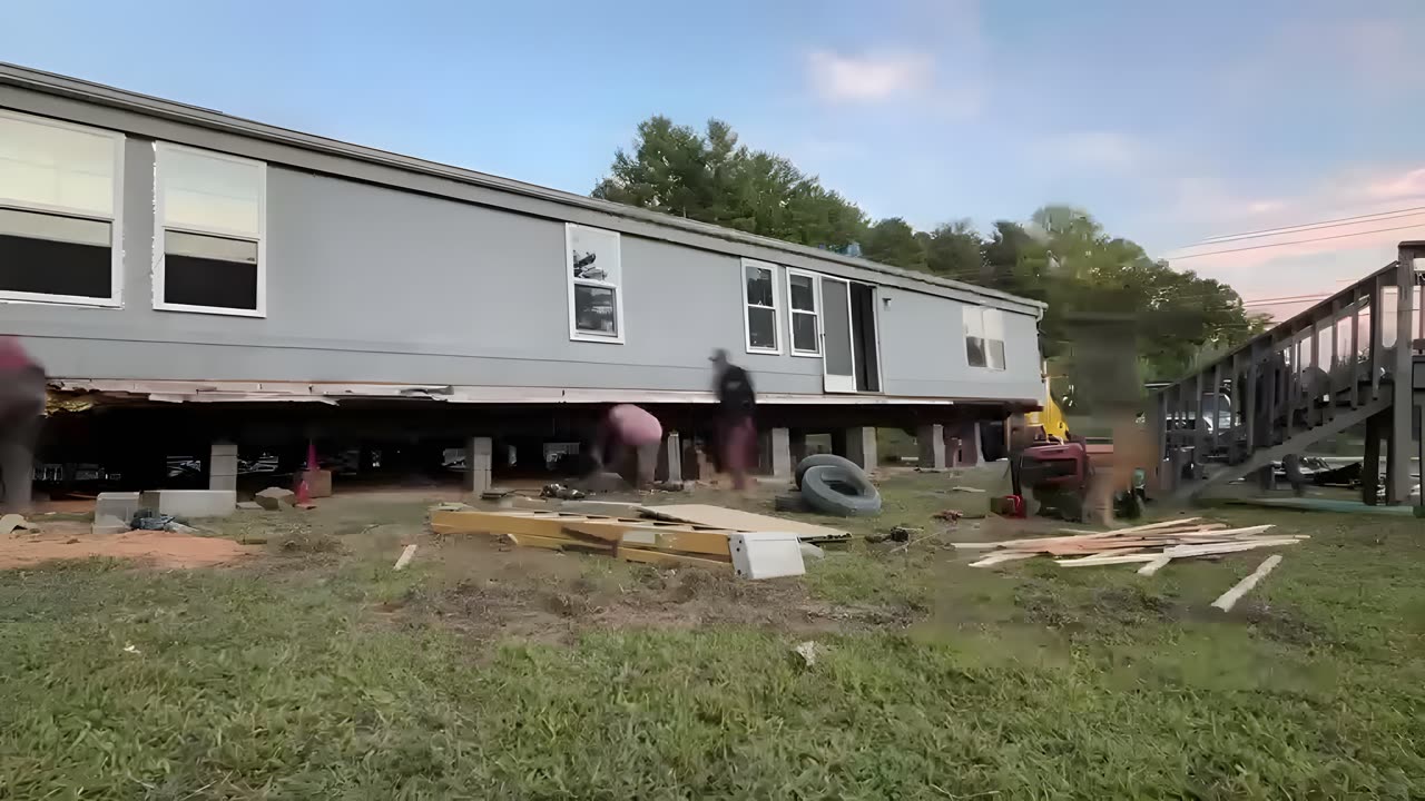 Our crew setting a single-wide on blocks